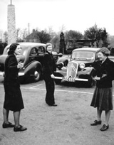 In the carpark at Hatfield House. Anne Cloudsley with an A.T.A. friend (centre) and 'Minto' Newman (right).