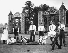 Patients play bowls outside the courtyard gates.