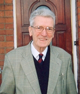 Bill outside his home in 2003
