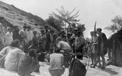 Nagas just in from Japanese lines being questioned by our interpreter.