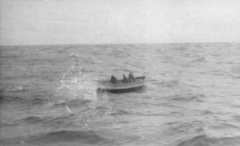 Four American survivors after a night in an open boat in bitter blizzard and gale conditions, north of Iceland, on North Russian Convoy, March 1943.