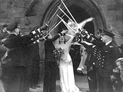 'Girl in a gale' - Mary and Geoffrey on their wedding day April 1945