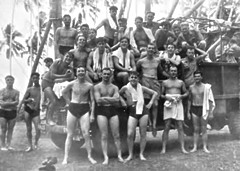 Ben Tota, Ceylon. Swimming party - HMS Illustrious. Eric Such pictured in doorway on right hand side.