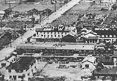 Kawasaki Camp from the air, with David's plea for food on the roof.