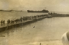 Reloading with Italian POWs bound for North Africa from the papers 
              of Jim Williams.