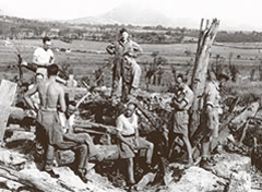 FSU examining German dugouts, Gustav Line. G Wooler