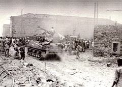Tanks arrive off the LCTs. G Wooler