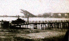 8th Hussar Cromwell crossing the 'Friendship' Bridge built by the Red Army to replace the destroyed Autobahn bridge on the motorway to Berlin, Summer 1945.