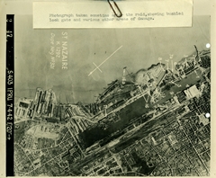 Photograph taken sometime after the raid, showing buckled lock gate and various other areas of damage. [R. Macleod]
