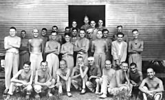 Maurice Cunningham and fellow ex FEPOWs at a US Hospital in the 
              Philippines, September 1945, Maurice is second from left on the 
              front row 