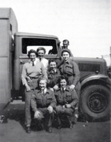 Peggie Stead, centre, with colleagues and her lorry at RAF Marham.