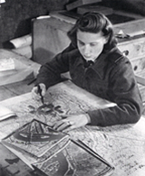 Jeanne Sowry interpreting reconnaissance photographs at RAF Benson.